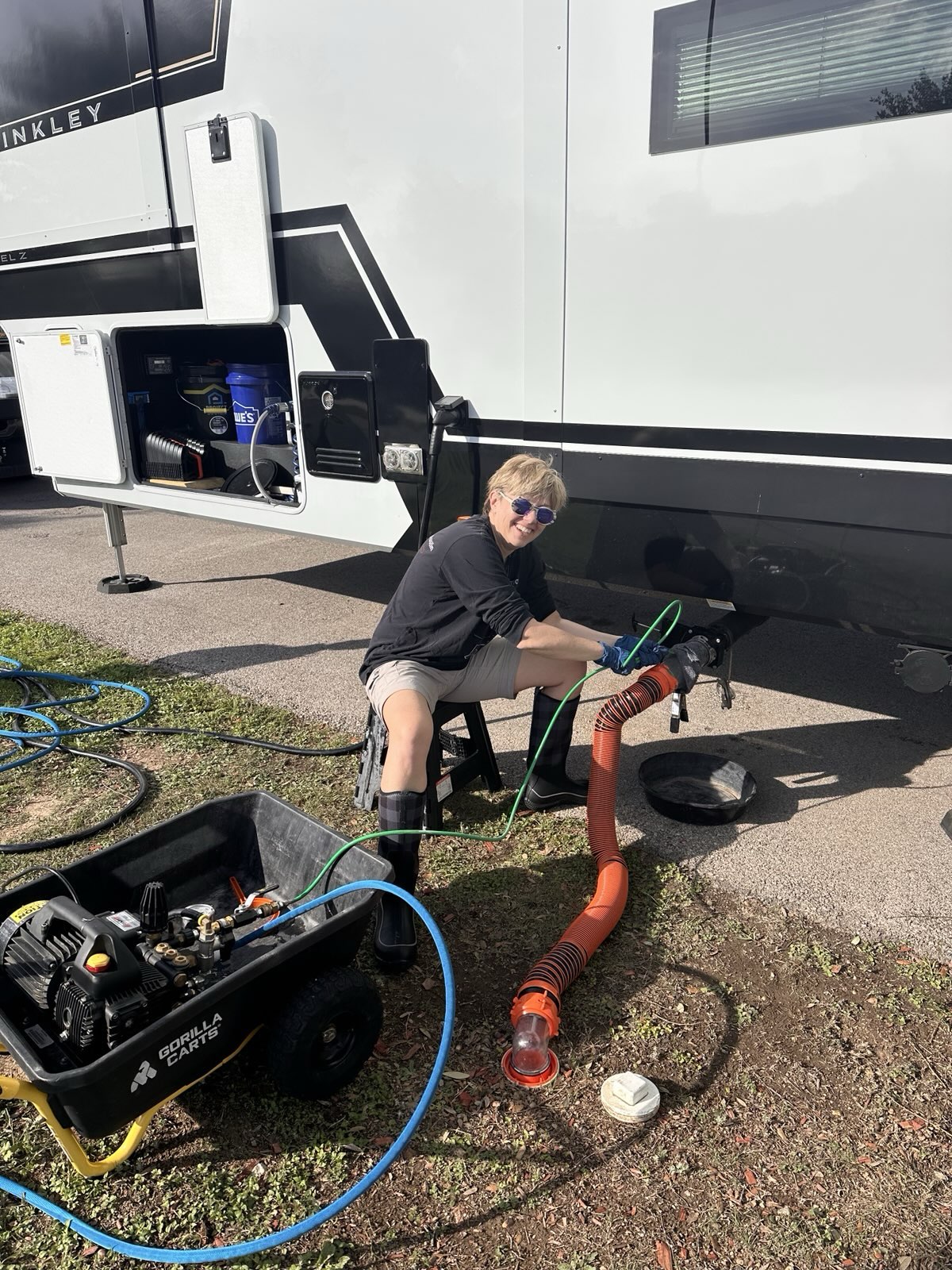 Judith performing hydro-jet tank cleaning on a Brinkley RV