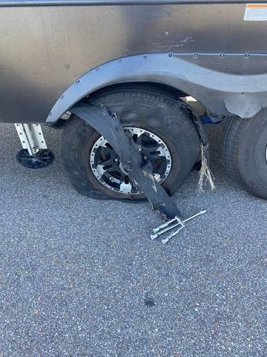 Blown RV trailer tire with shredded sidewall found during a pre-haul inspection